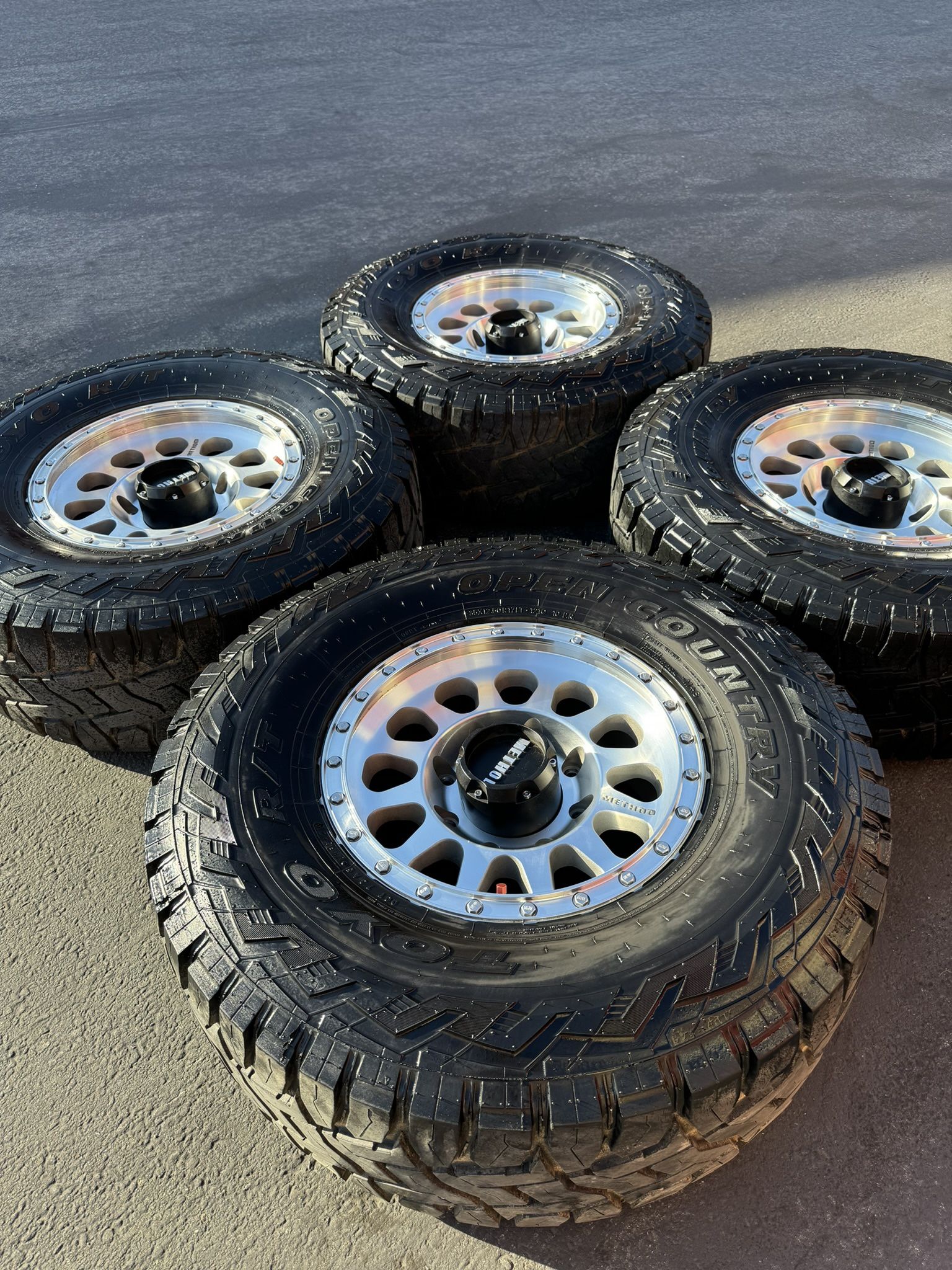 8 Lug Duramax Chevy GMC 2500 Method MR315 17” Machined Wheels And 35” Toyo R/T Tires