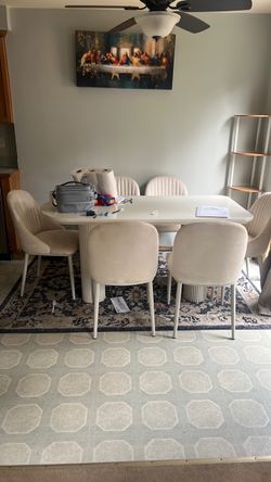 White Dining Table with 6 Cream Chairs