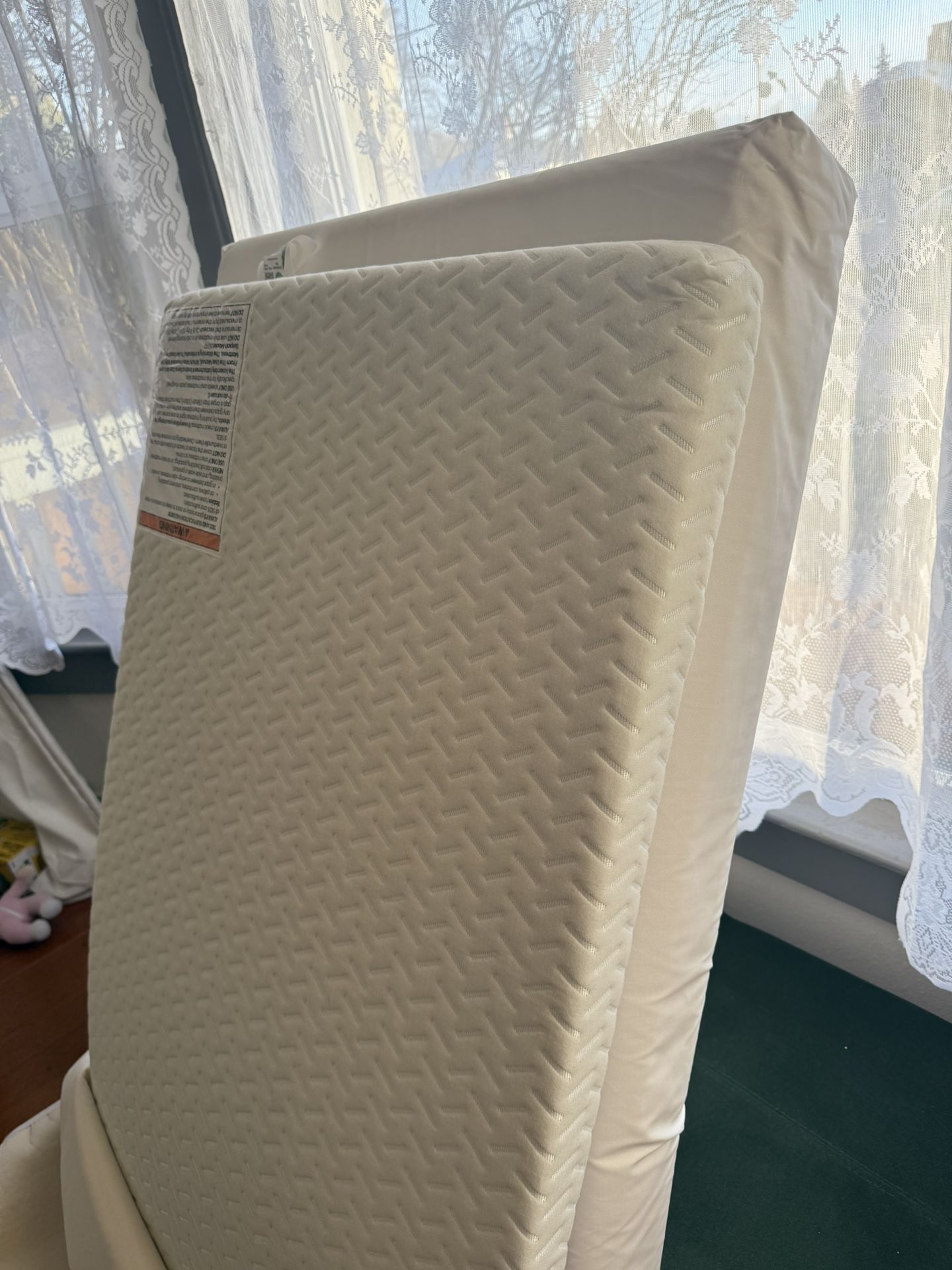 Crib mattress with Memory foam topper and waterproof Cover