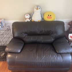Black Leather Sofa, Adjustable into a bed 