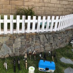 TEN (10) Fishing Rods with Reels plus a large spool of line plus Tackle box.