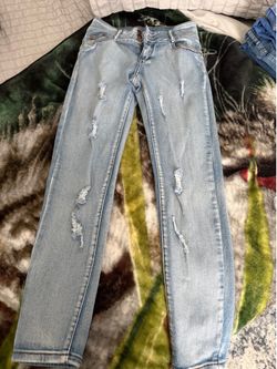 Distressed Light Wash Skinny Jeans