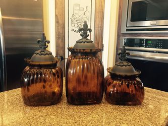 Leopard print kitchen canisters with wrought iron lids