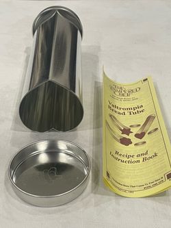 Pampered Chef heart-shaped bread tube mold with instructions.