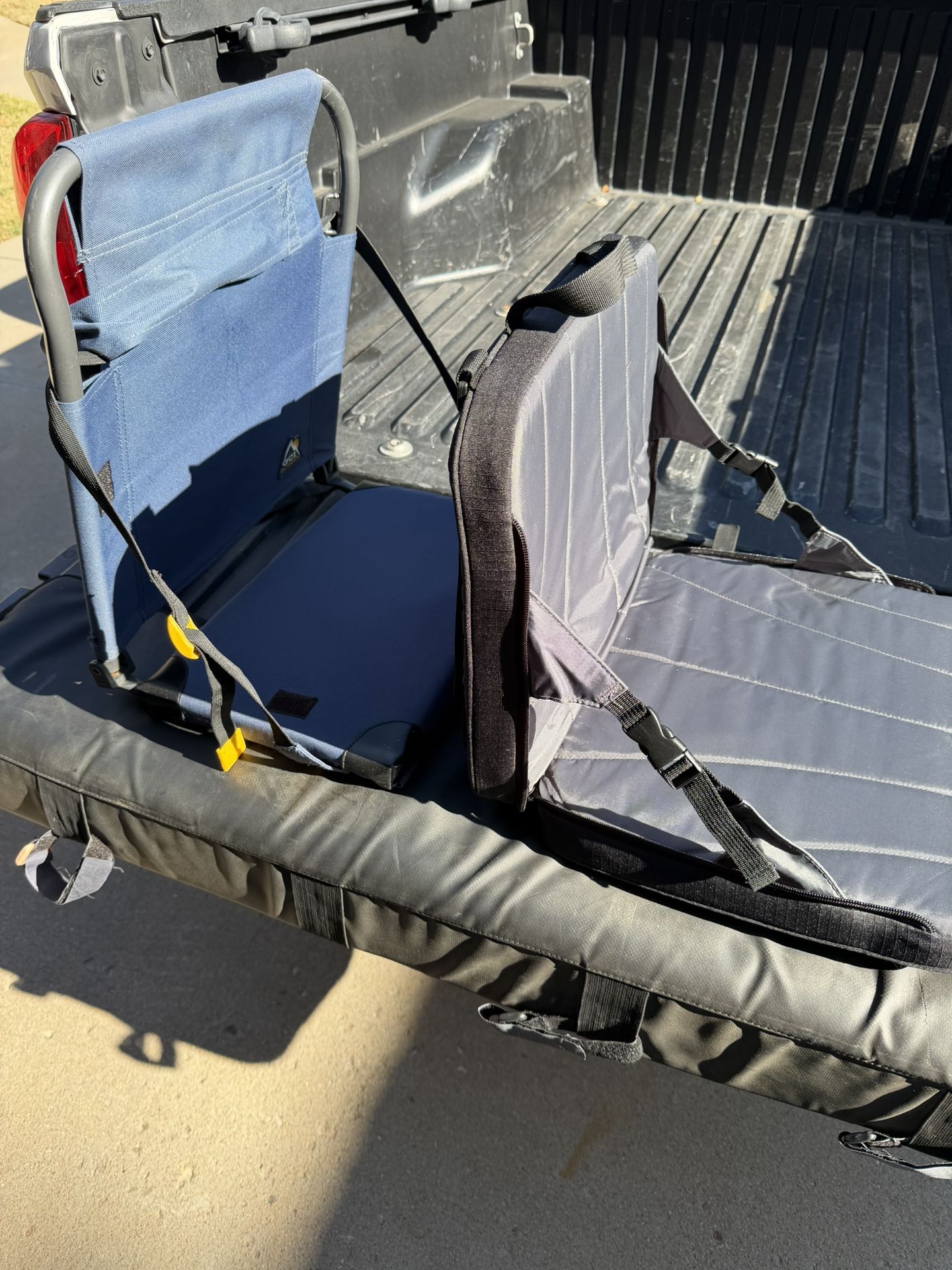 Two Like New stadium chairs - can deliver