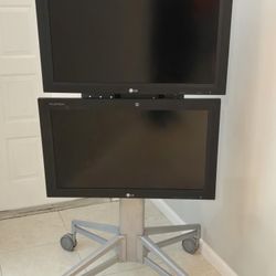 Qty. 2 - 32 Inch LG monitors Model M3203CCBA. With LG Smart Remote.  Portrait Or Landscape Display