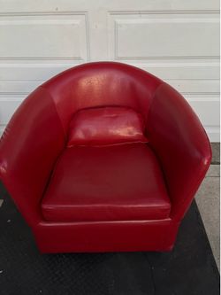 Red leather like barrel swirl chair