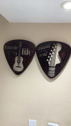 Metal guitar pick signs