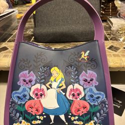 Alice In Wonderland Loungfly. New.  Crossbody 