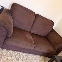 Free storage cabinet, coffee table,  rug and couch.