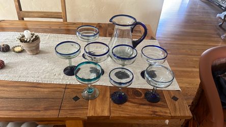 Hand blown blue rimmed Mexican glasses and pitcher