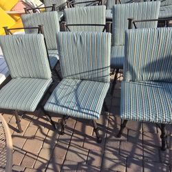 $300  ARIZONA IRON SWIVEL CHAIRS WITH NEW SUNBRELLA CUSHIONS 