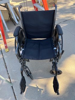 Medline comfortable folding wheelchair. Very good condition.