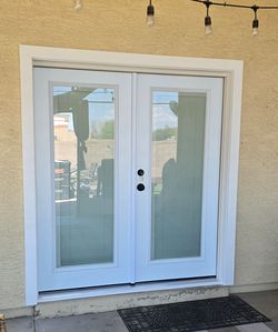 New exterior french doors with built-in blinds