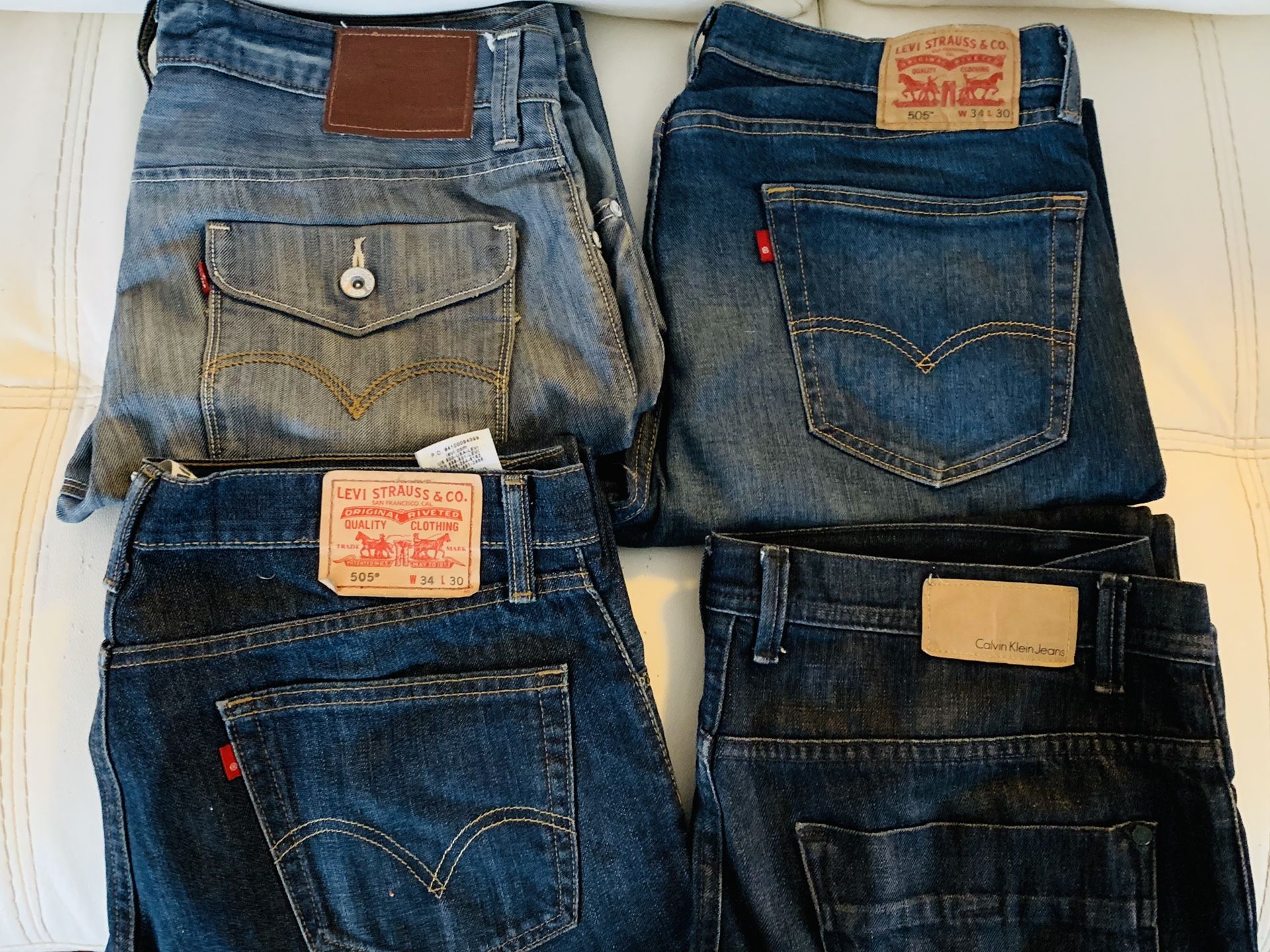 Four Levi’s Strauss Jeans 34-30
