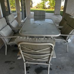 Outdoor Table with 6 Chairs/6 Cushions