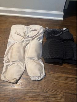 Two football bottoms , size medium