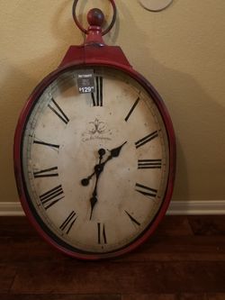 large red wall clock