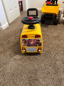 CoComelon Musical School Bus Ride-On Toy