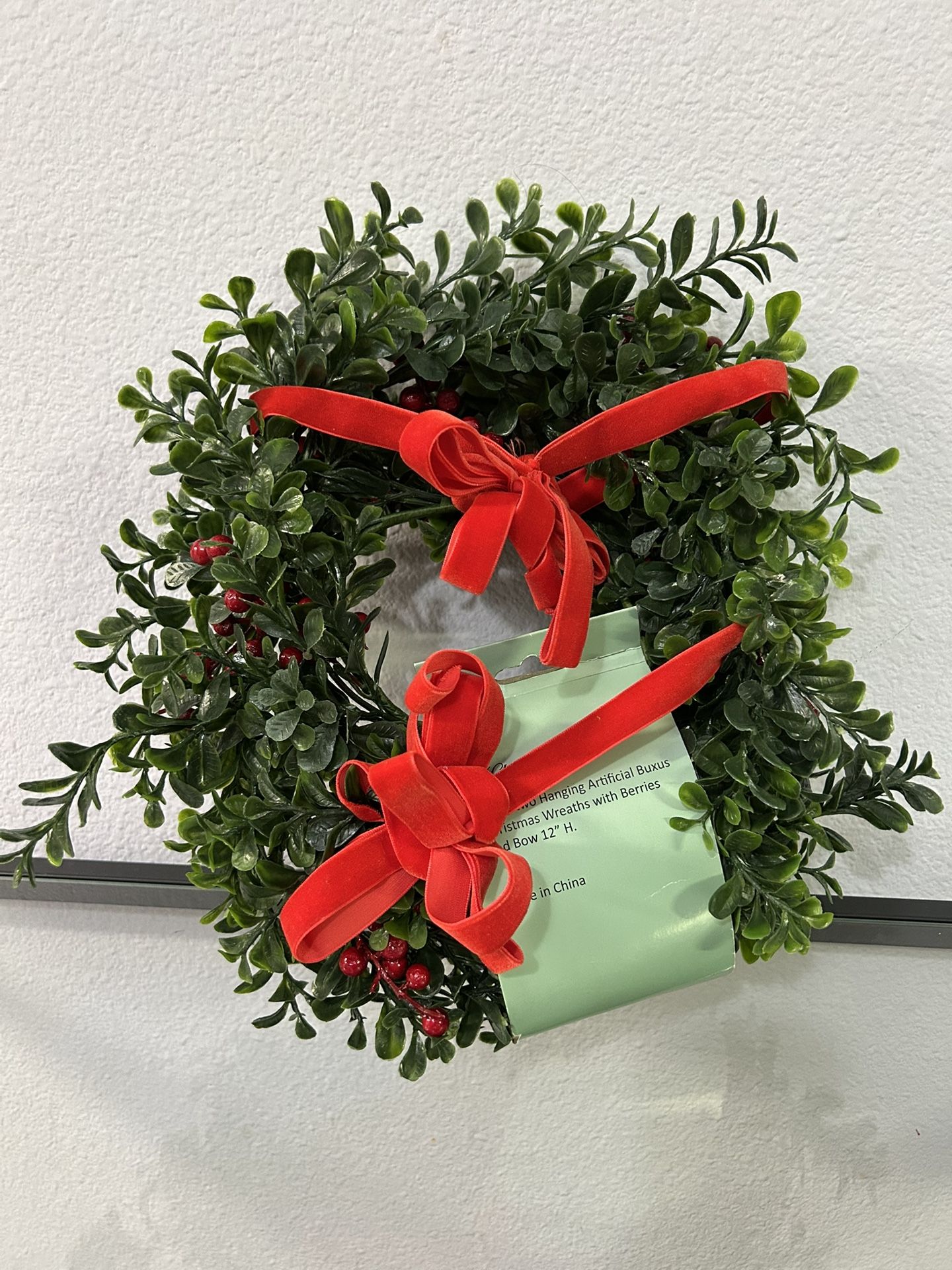 Set of two Hanging Artificial Buxus Christmas Wreaths with Berries and Bow 12" H.