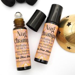 🌺 Nag Champa Roll-On Perfume Oil – 10ml 🌺 ✨ Calming • Exotic • Spiritual Aroma  A timeless scent known for its earthy, sweet, and meditative vibe. T