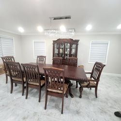Gorgeous solid wood table, chairs and China closet