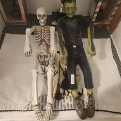 Frankenstein And Skeleton Being Dragged Statues