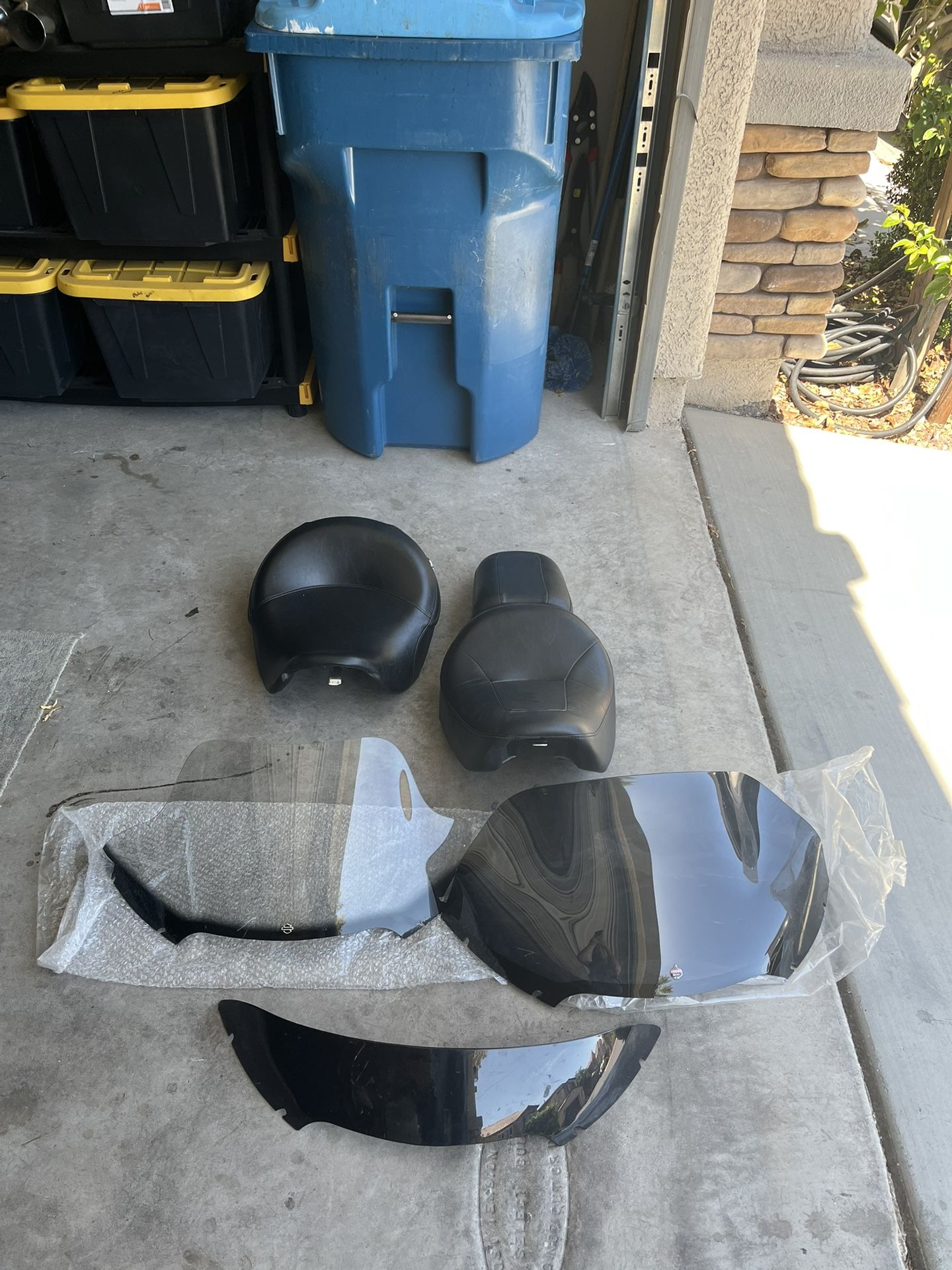 Motorcycle seats and windshields. (all sold separately)
