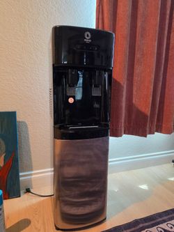 PRIMO Water Dispenser w/ Six Five Gallon Bottles