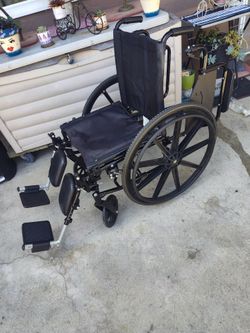 USED AMP WHEELCHAIR IN VERY GOOD CONDITION