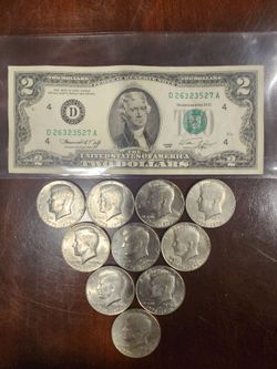 1976 Bicentennial half dollar coins and Two dollar bill