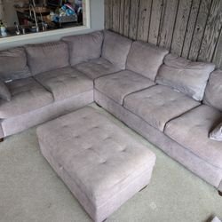 Grey Fabric Sectional and Ottoman (Costco)
