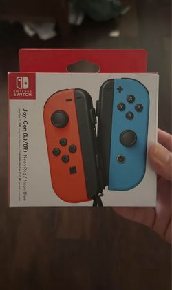 Brand New (Sealed) Nintendo Switch Joycons - Neon Red/ Neon Blue