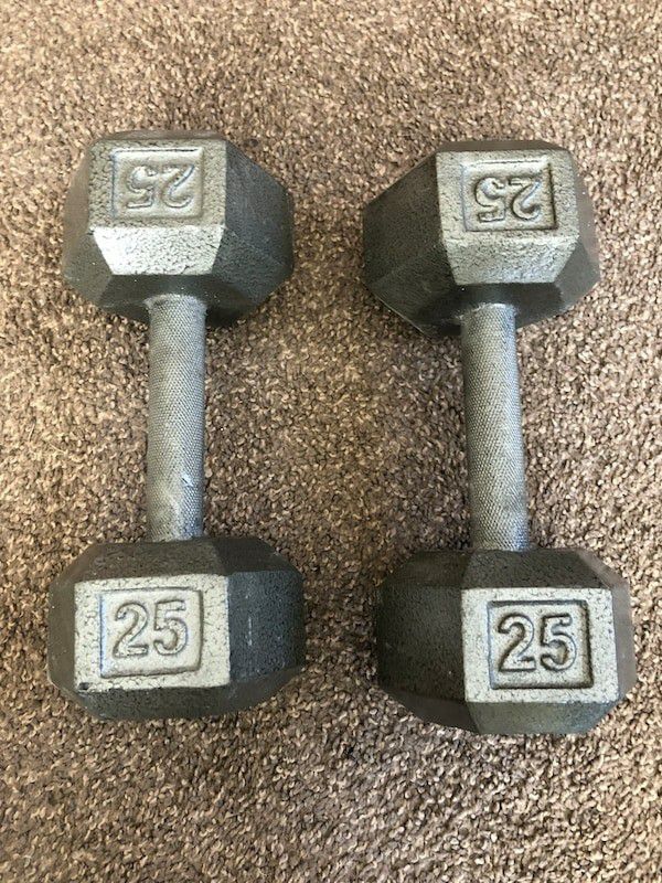 Lot of dumbells, barbells and an ab carver