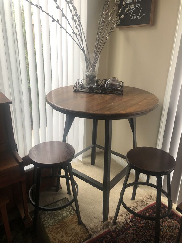 Pottery Barn Pub Table with two adjustable stools for Sale in Irvine