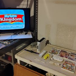 Nintendo Wii Bundle with Remote, Nunchuck, Games, etc.