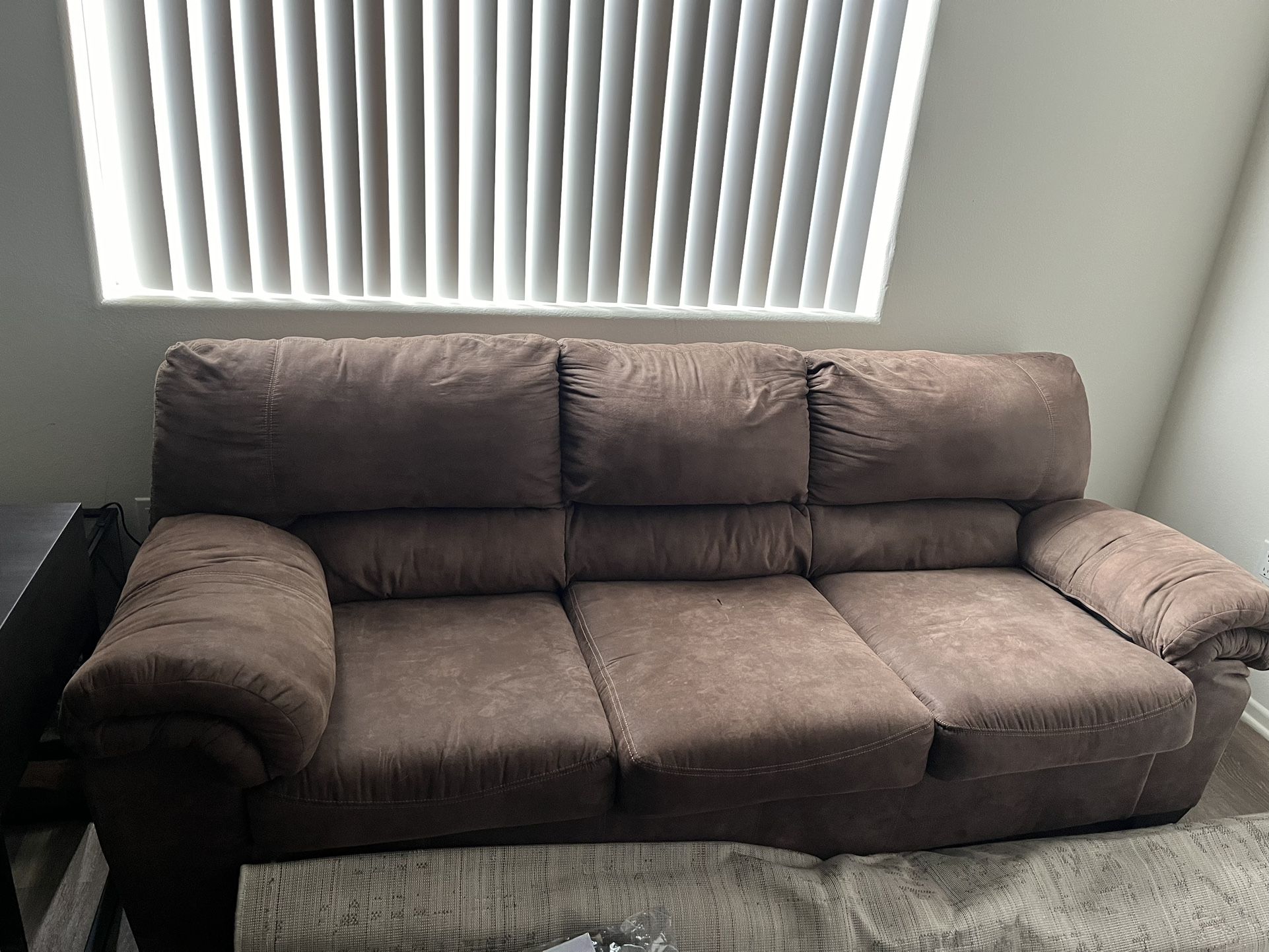 BROWN COUCH WITH PULL OUT BED