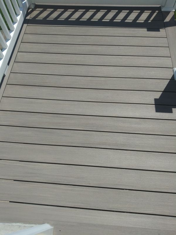 Designer Azek Composite Deck Boards. Color is "Coastal" 1"x 6"x 12
