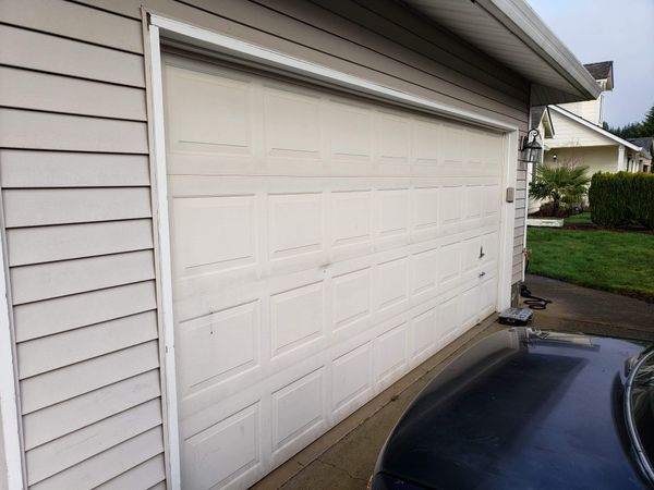 Modern Double Garage Door Installation Cost for Small Space