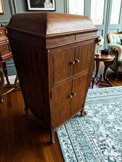 Antique victrola converted Cabinet with Stereo