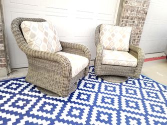 2 Sunbrella Large heavy rocking swivel chairs.
