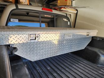 Toyota Tacoma tool box with keys and anchoring hardware