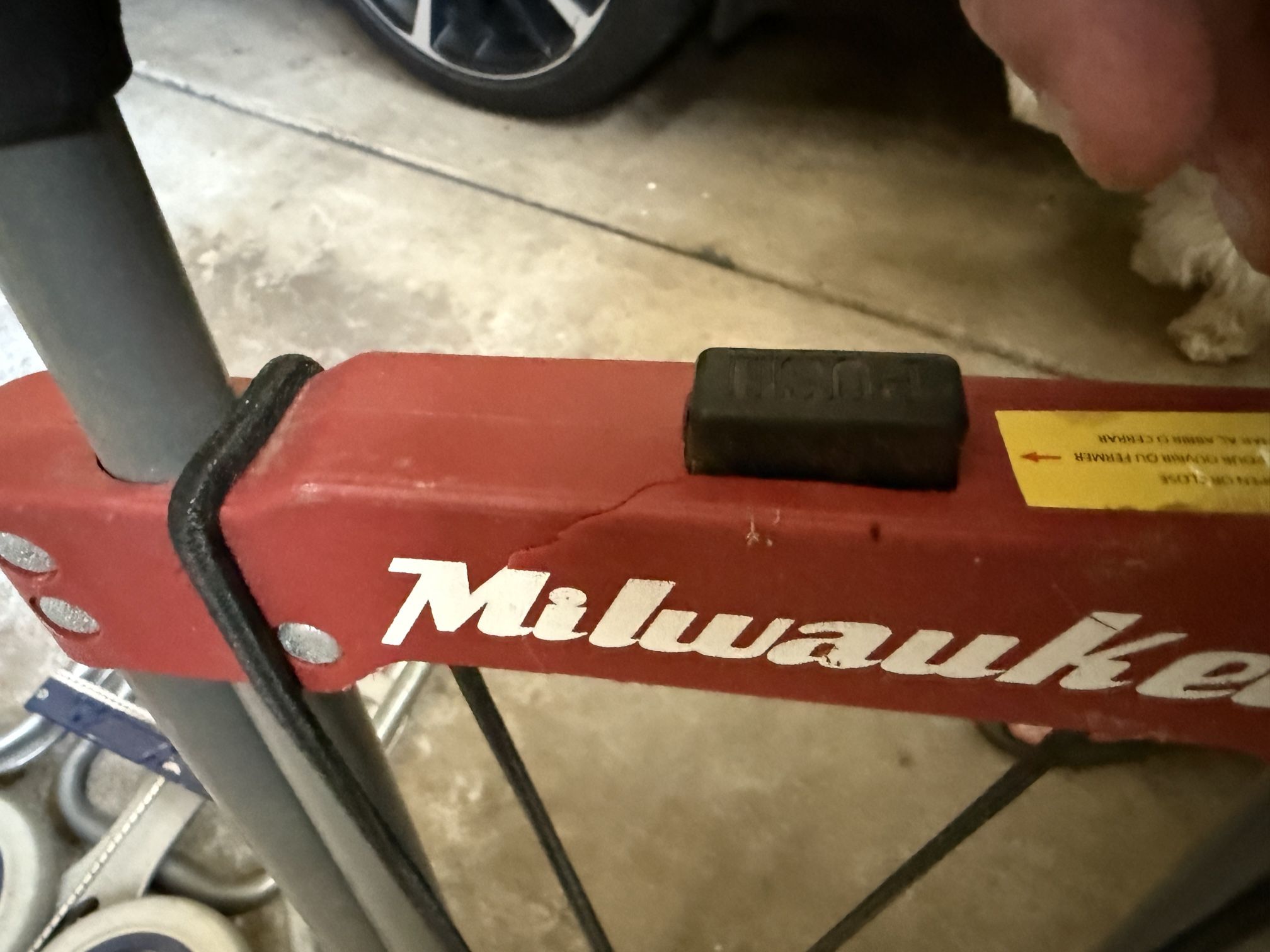 Milwaukee Tool Carrying 2 Wheeler With Crack In Red Plastic On Top, $20 cash. Must meet in person.
