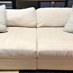 Living Spaces 2 Piece Armless Modular Sofa.