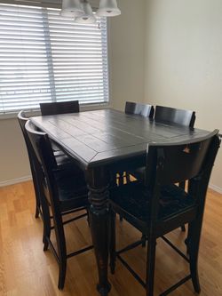 Tall black used dinning set