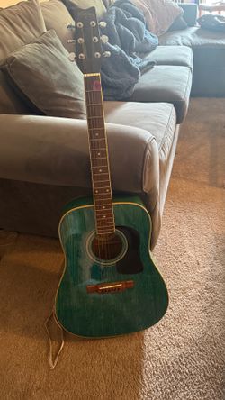Washburn acoustic guitar — turquoise