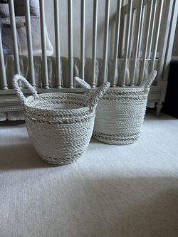 A Set Of Two Medium Baskets 