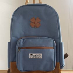 Lucky Brand With A Navy Blue Color And Brown Details