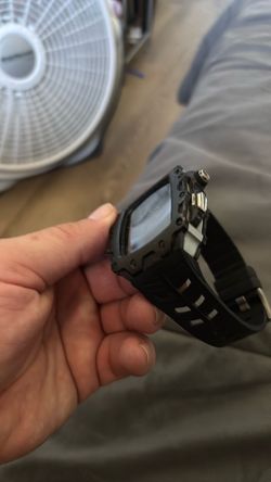Just the titanium protection case dent and scratch free Apple Watch inside …locked but that’s feee