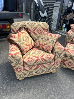 2 Aztec Print Chairs With Pillows 